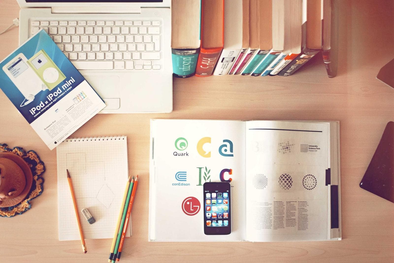 Placeholder image: A calm desk with a laptop, notebook and a cup of tea